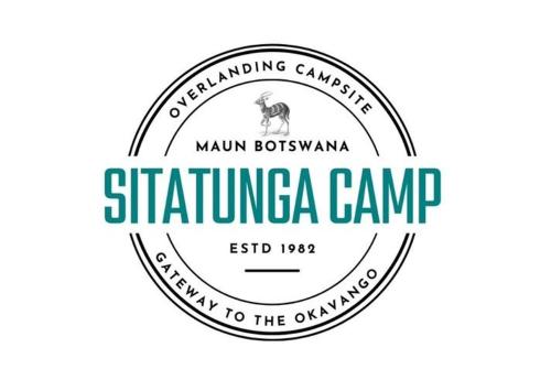 a stamp for the stirling camp with a dog in the middle at Sitatunga Campsite Maun in Maun