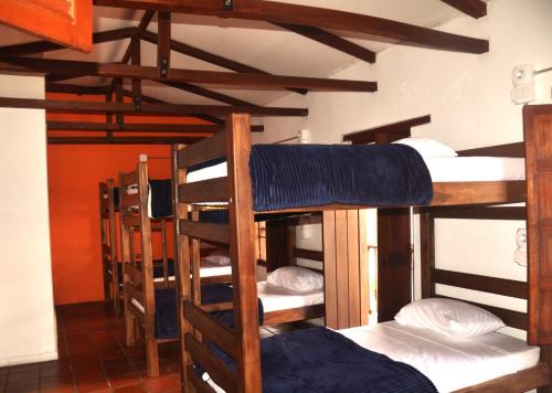 a group of bunk beds in a room at Ríos Voladores Hostel in Bogotá