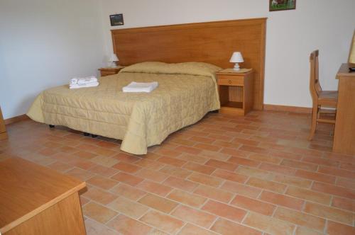 Postel nebo postele na pokoji v ubytování Agriturismo BioSila