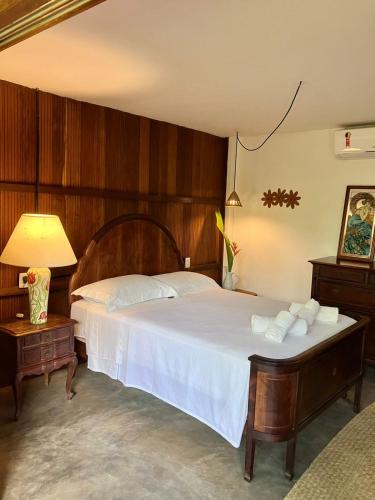 Katil atau katil-katil dalam bilik di Boa Village- Bungalow com Piscina Natural- Praia de Algodões