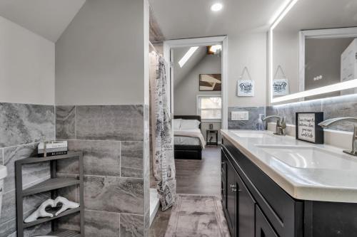 a bathroom with a sink and a mirror at The Davey Retreat in Buffalo