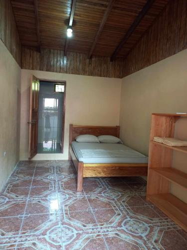 Ένα ή περισσότερα κρεβάτια σε δωμάτιο στο Surf Shack Entire House, 3 Bedrooms