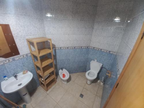 a bathroom with a toilet and a sink at مالاباطة in Tangier