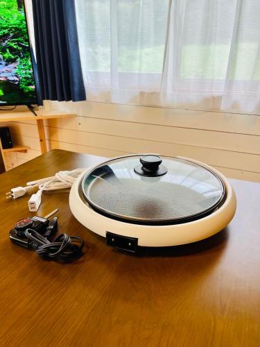 Tsukawakiにある一棟まるっと温泉別荘 天井高7ｍ 50インチ映画見放題 屋根付BBQ 街まで車7分 湯布院30分 アニメ聖地10分のギャラリーの写真