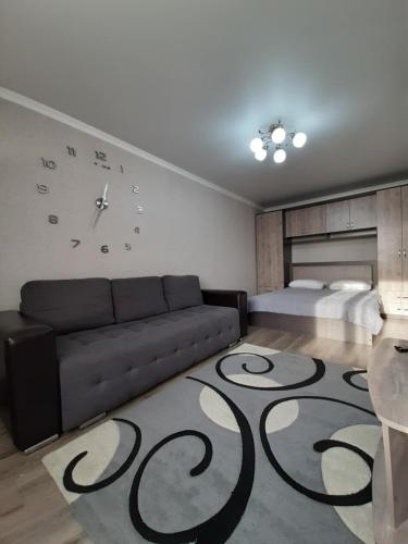 Ruang duduk di Квартира в ЦЕНТРЕпо ул.Ермекова,52