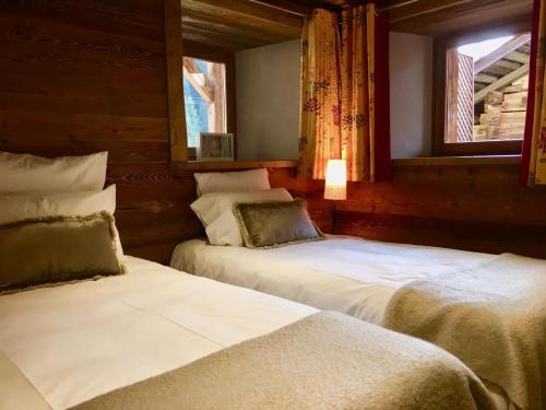 Posteľ alebo postele v izbe v ubytovaní Appartement cosy pour 6 personnes avec parking au Grand-Bornand - FR-1-467-84