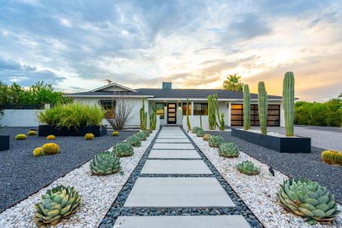 a house with a garden with cactus at The Agave Oasis in Scottsdale