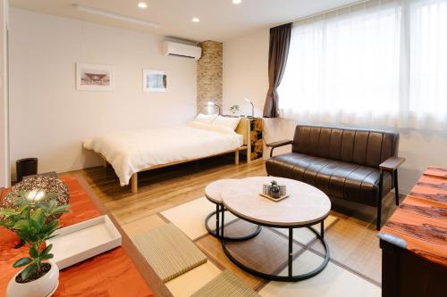 Posezení v ubytování 金澤屋　昭和町