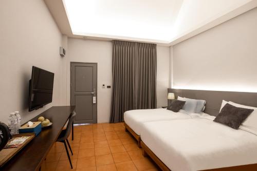 Postel nebo postele na pokoji v ubytování VIYA lodge