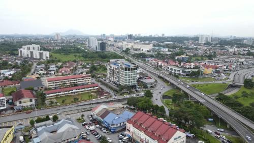 an aerial view of a city with a highway at Roxy Hotel & Apartments in Kuching