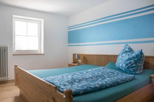 Postel nebo postele na pokoji v ubytování Ferienhof Hochglend