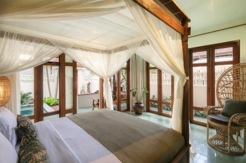 เตียงในห้องที่ Rumah Senang - Walk to Beach