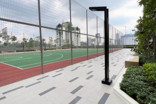 a tennis court with a tennis court at Sentral Suites Kuala lumpur By Leyla 3BR suites 8 pax in Kuala Lumpur