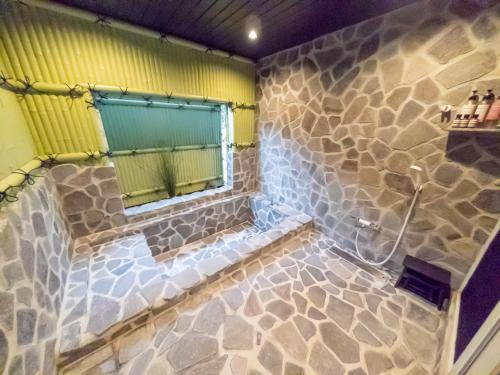 Bilik mandi di 1日1組限定Villa Dazaifu 露天風呂付1棟貸し