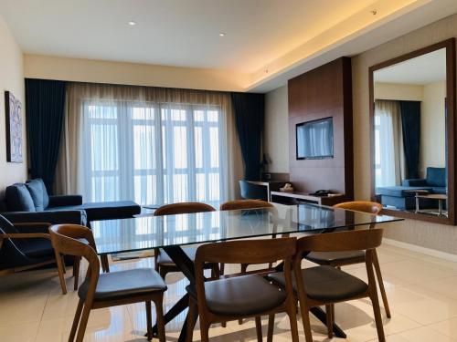 TV a/nebo společenská místnost v ubytování Tribeca Serviced Hotel by Millennium