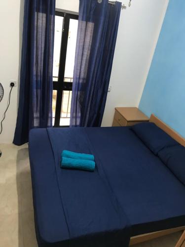 Cama ou camas em um quarto em Gzira Centre Apartment