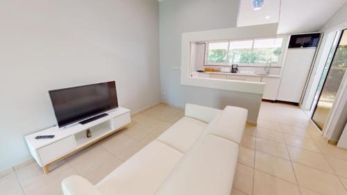 Televisyen dan/atau pusat hiburan di Karucoco Lodge