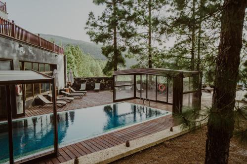 Bazén v ubytování Hotel Spa Villalba nebo v jeho okolí