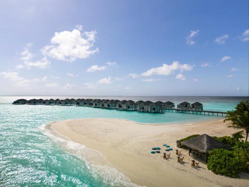 an aerial view of the beach at the excellence punta cana resort at NH Collection Maldives Havodda Resort - Stays of 6 nights or more, 50 percent off domestic flights for 2 person in Gaafu Dhaalu Atoll