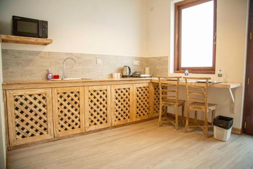 Dapur atau dapur kecil di Iddamal Bay Apartments