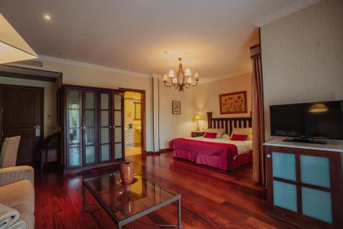 Postel nebo postele na pokoji v ubytování Hotel Spa Villalba