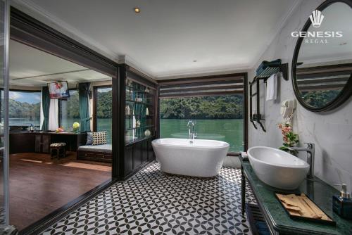 a large bathroom with a tub and a sink at Genesis Luxury Regal Cruise by Premier Group in Ha Long