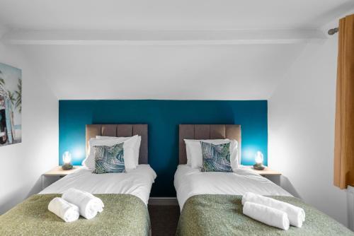 Krevet ili kreveti u jedinici u okviru objekta Well Coach House by Cliftonvalley Apartments