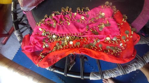 a pink umbrella with a crown on top at JUNGLE GYM LA UNION Prana fan kubo 2 pax in Rimus