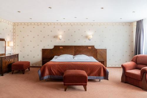 Posteľ alebo postele v izbe v ubytovaní Hotel Alf