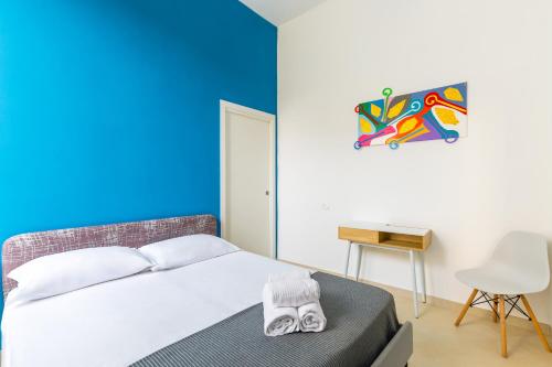 Voodi või voodid majutusasutuse Orsola Comfort House by Napoliapartments toas