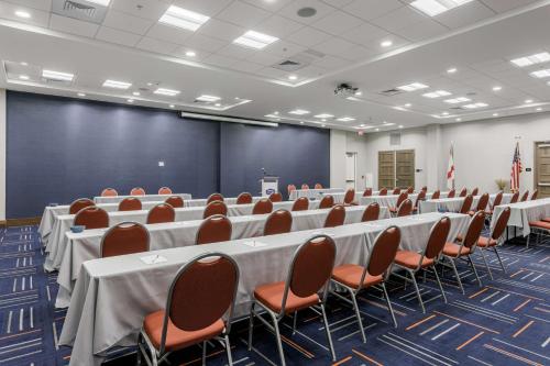 a conference room with tables and chairs in it at Hampton Inn & Suites - Orange Beach in Orange Beach