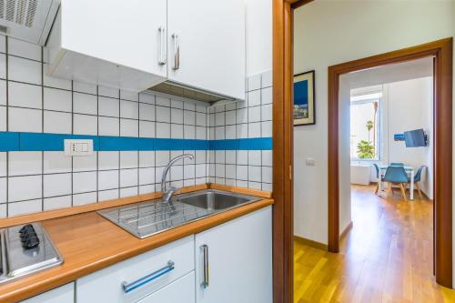 San Luigi cozy flat - private parking