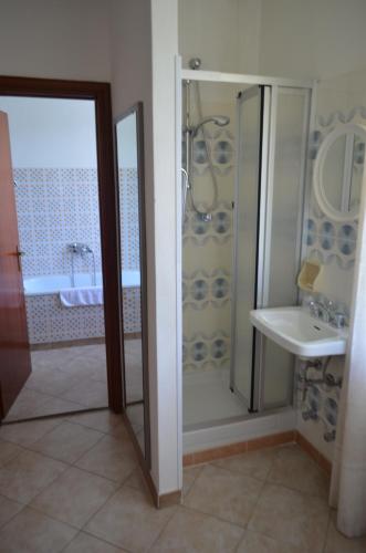 a bathroom with a shower and a sink at Albergo Diana in Tronzano Lago Maggiore