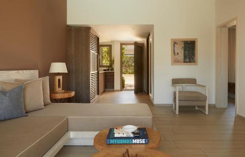 a living room with a couch and a table at Mare Ayia Napa in Ayia Napa