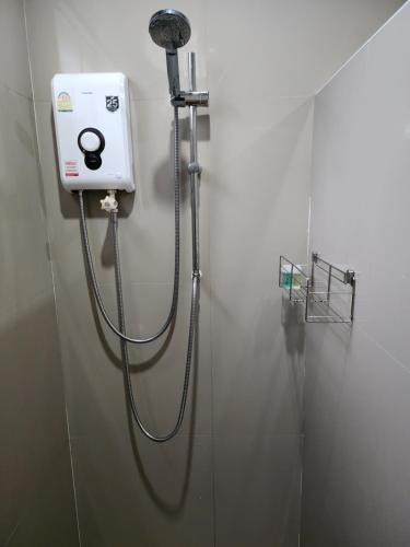 a shower in a bathroom with a blow dryer at Villa for rent in Ko Chang