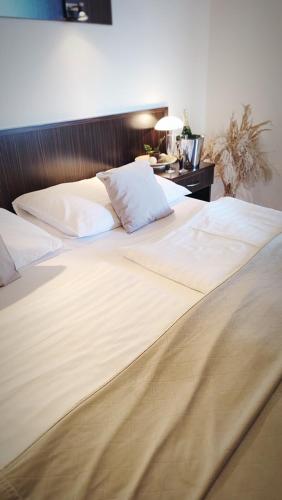Hotel Ambraにあるベッド