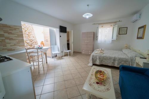 Ένα ή περισσότερα κρεβάτια σε δωμάτιο στο Tenuta Rosa Casa Salento Holidays