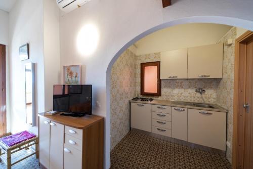 Kuchyň nebo kuchyňský kout v ubytování Gavila's Residenza Turistico Alberghiera