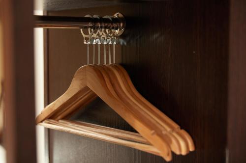 a wooden object is hanging on a door at The Quays by Greene King Inns in Northampton