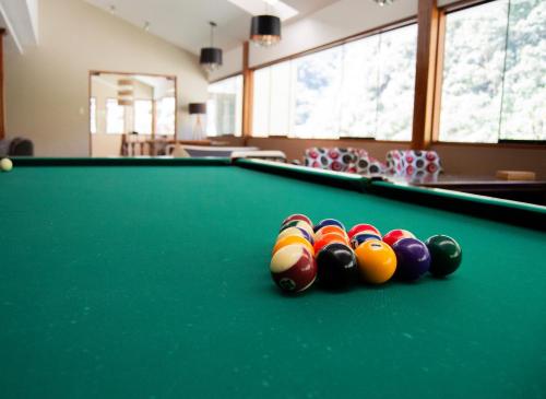 a group of balls on a pool table at Santuario Machupicchu in Machu Picchu