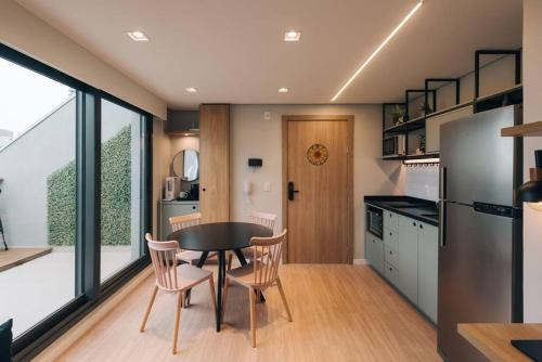 Dapur atau dapur kecil di Studio exclusivo no Parque Una com vaga de garagem