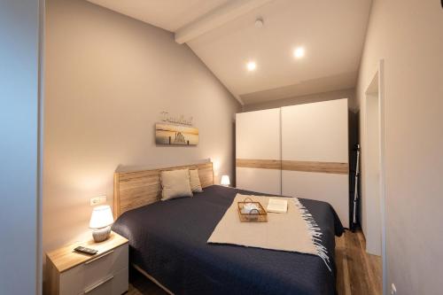 Postel nebo postele na pokoji v ubytování MP28 - Strandnixe Komfort