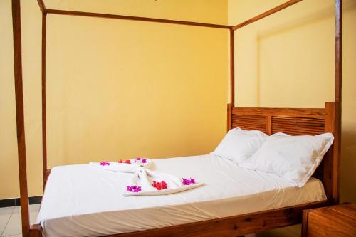 Ein Bett oder Betten in einem Zimmer der Unterkunft TOFO HORIZONTE