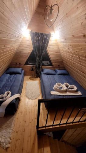 Postel nebo postele na pokoji v ubytování MTISGULI Cottages