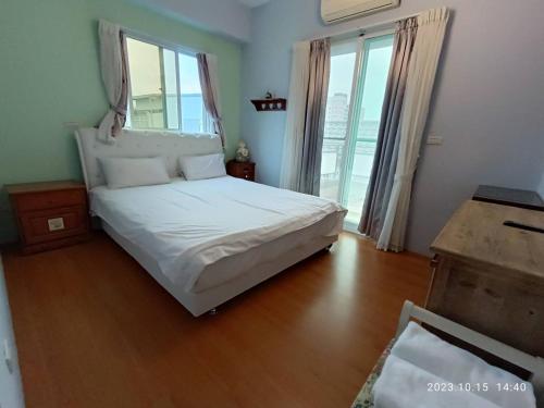 Una cama o camas en una habitación de 茶樂二重奏