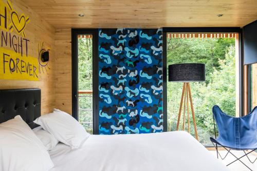Un ou plusieurs lits dans un hébergement de l'établissement Loire Valley Lodges - Hotel