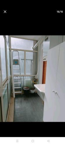 a large bathroom with a tub and a sink at Case vacanze Monroe 1 in Palermo