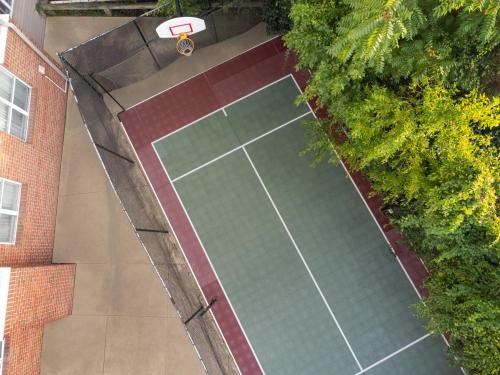 an overhead view of a tennis court in front of a building at Residence Inn Boston Dedham in Dedham