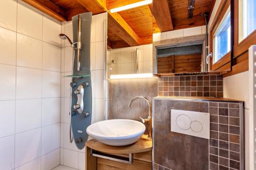 a bathroom with a sink and a toilet in it at Villa Natura in Meschede