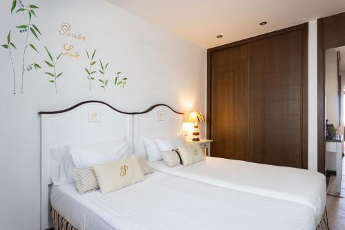 Ένα ή περισσότερα κρεβάτια σε δωμάτιο στο The Paradise Suites by Anne, charm apartment in Adeje